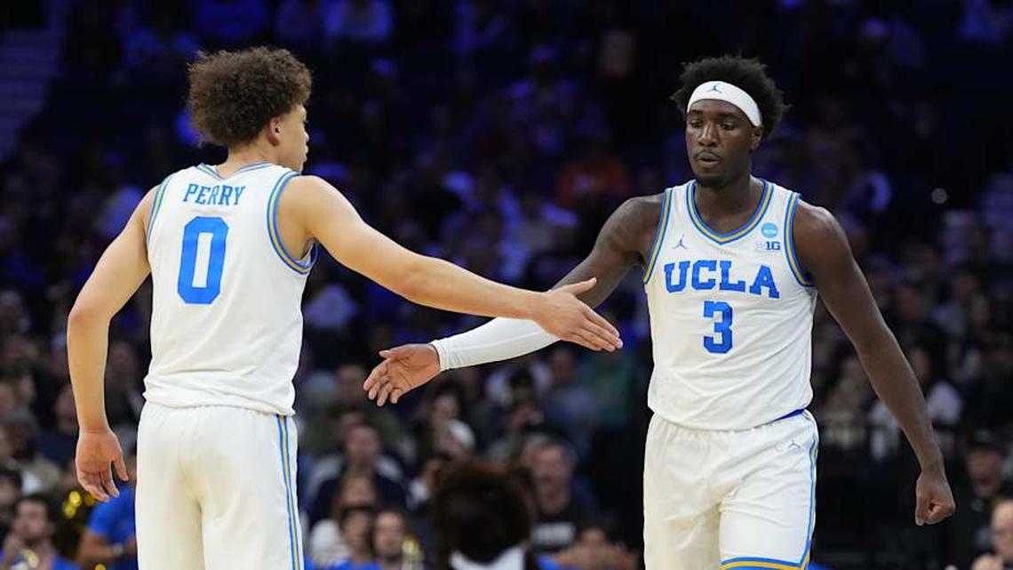  Mar 20, 2026; Philadelphia, PA, USA; UCLA Bruins forward Eric Dailey Jr. (3) and guard Trent Perry (0) react in the first half during a first round game of the men's 2026 NCAA Tournament at Xfinity Mobile Arena. Mandatory Credit: Kyle Ross-Imagn Images | Kyle Ross-Imagn Images 