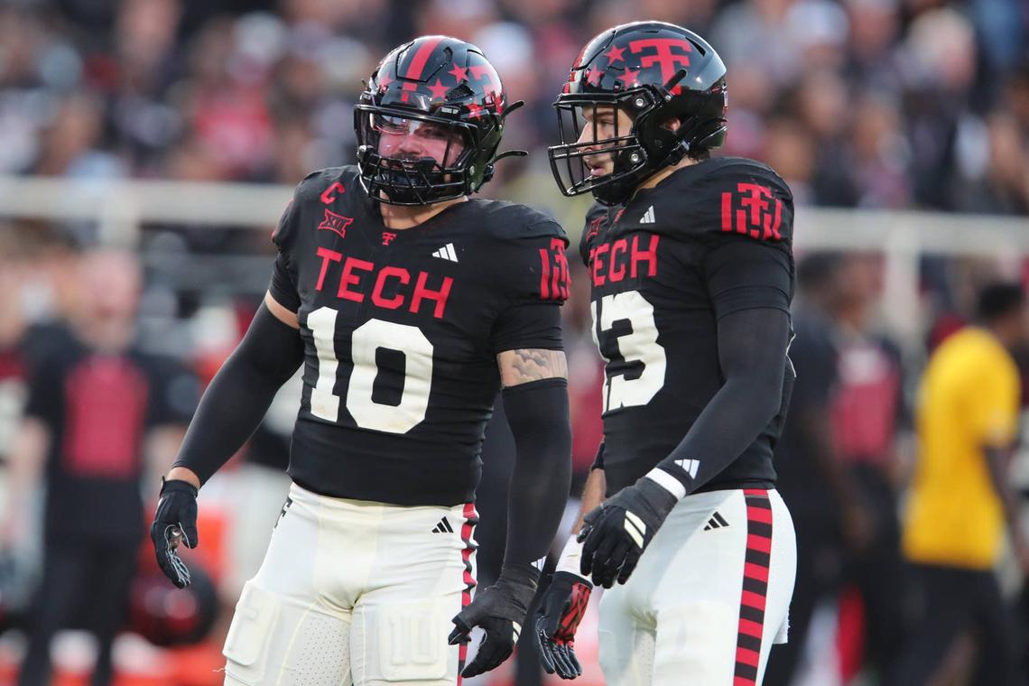  Texas Tech Red Raiders linebacker Jacob Rodriguez speaks to defensive back Ben Roberts during their team's game against the Kansas Jayhawks in Lubbock, Texas, on Oct. 11, 2025. Michael C. Johnson-Imagn Images