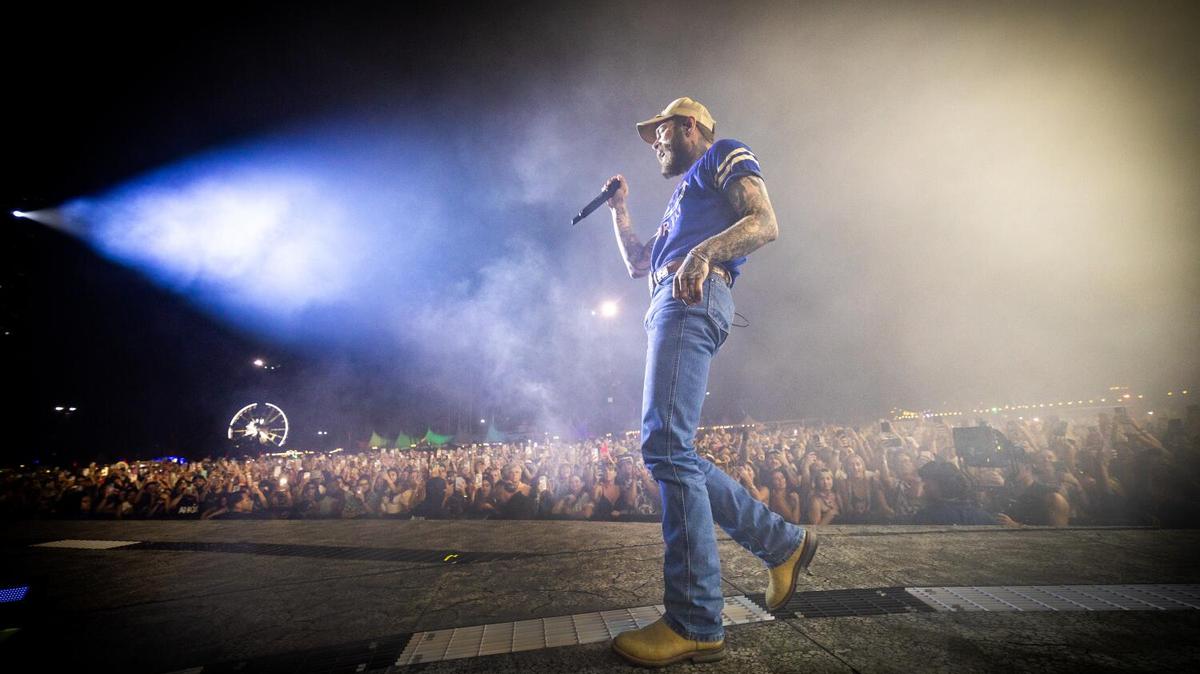 Indio, CA. April 13, 2025 - Post Malone performs at the Coachella Main Stage at the 2025 Coachella in Indio, CA on Sunday, April 13, 2025. (Allen J. Schaben / Los Angeles Times)