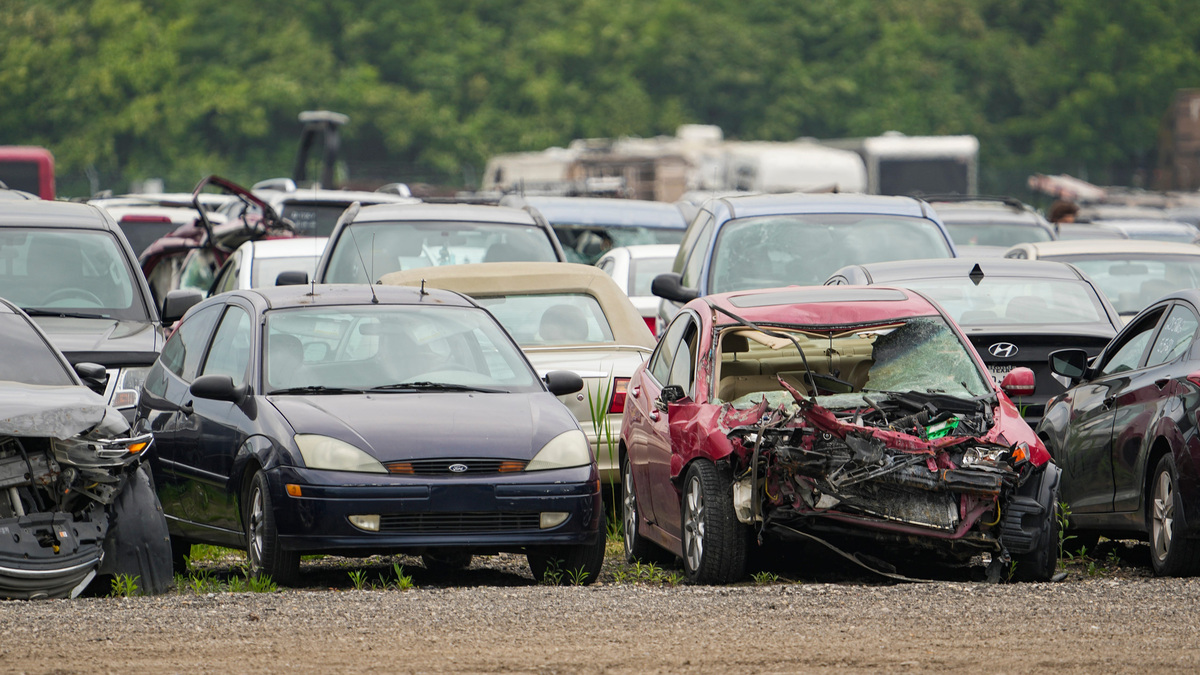 Vehicles sit in the Columbus Division of Police Impound & Parking Services lot off Haul Road south of State Route 104 on the