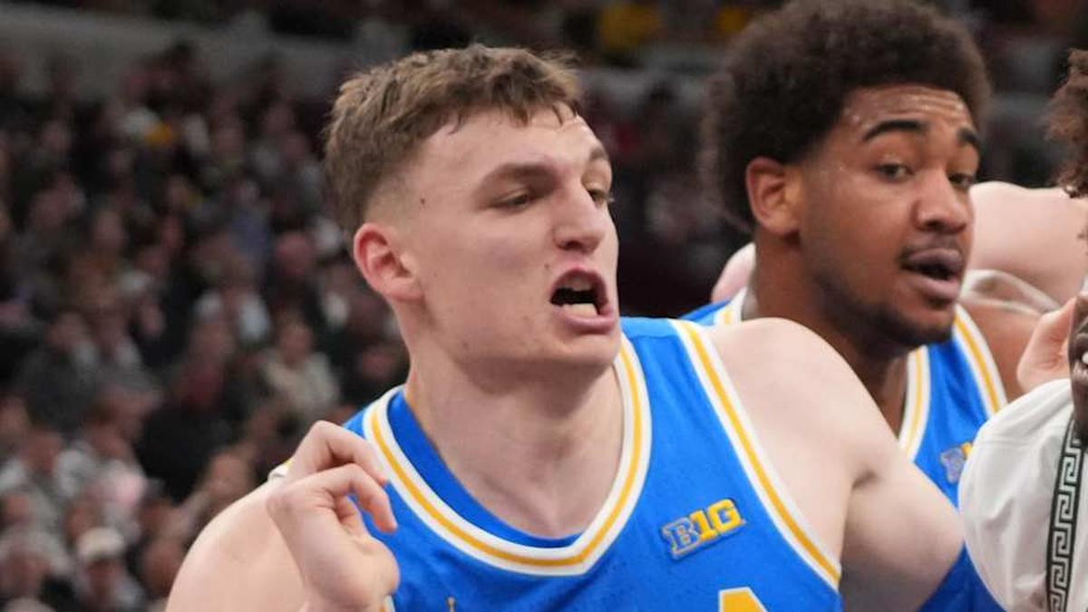  Mar 13, 2026; Chicago, IL, USA; UCLA Bruins guard Eric Freeny (8) forward Tyler Bilodeau (34) defends Michigan State Spartans forward Coen Carr (55) during the first half at United Center. Mandatory Credit: David Banks-Imagn Images | David Banks-Imagn Images 
