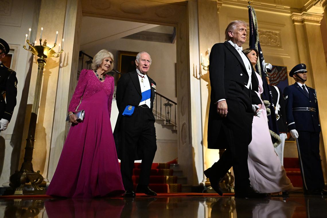 President Donald Trump and first lady Melania Trump, right, walk with King Charles III and Queen Camilla of the United Kingdom to a state dinner at the White House in Washington, on Tuesday, April 28, 2026. (Kenny Holston/The New York Times)