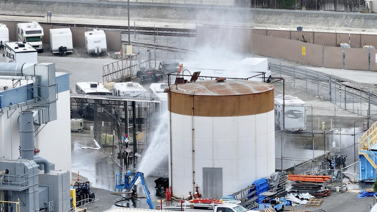 Water is sprayed on a 34,000-gallon tank that overheated at GKN Aerospace in Garden Grove, California, on Friday, May 22, 2026. (Jeff Gritchen/Orange County Register/TNS)