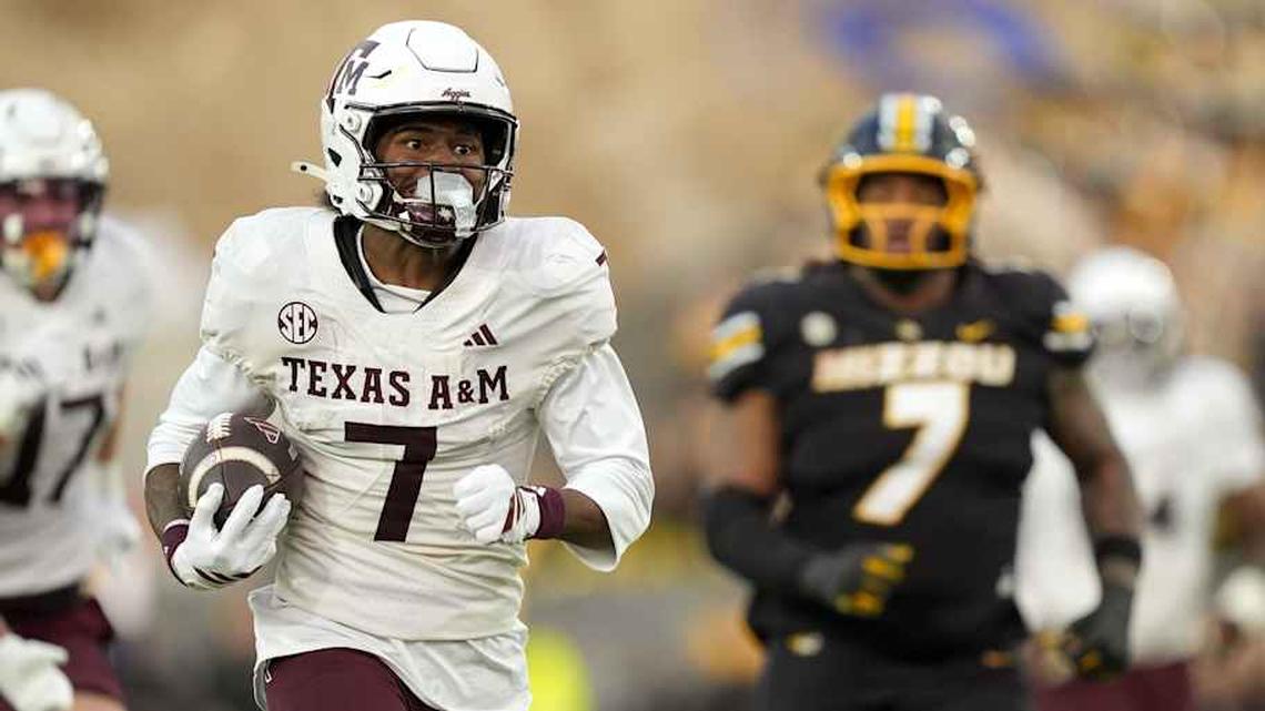  Nov 8, 2025; Columbia, Missouri, USA; Texas A&M Aggies wide receiver KC Concepcion (7) runs for a touchdown during the second half against the Missouri Tigers at Faurot Field at Memorial Stadium. Mandatory Credit: Jay Biggerstaff-Imagn Images | Jay Biggerstaff-Imagn Images 