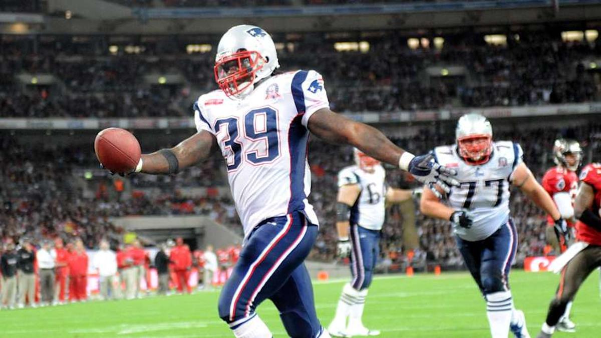  October 25, 2009; London, ENGLAND; New England Patriots running back Laurence Mauroney (39) reacts after scoring on a 1-yard touchdown run in the fourth quarter during the regular season NFL International Series game against the Tampa Bay Buccaneers at Wembley Stadium. The Patriots defeated the Buccaneers 35-7. Mandatory Credit: Kirby Lee/Image of Sport-Imagn Images | Kirby Lee-Imagn Images 
