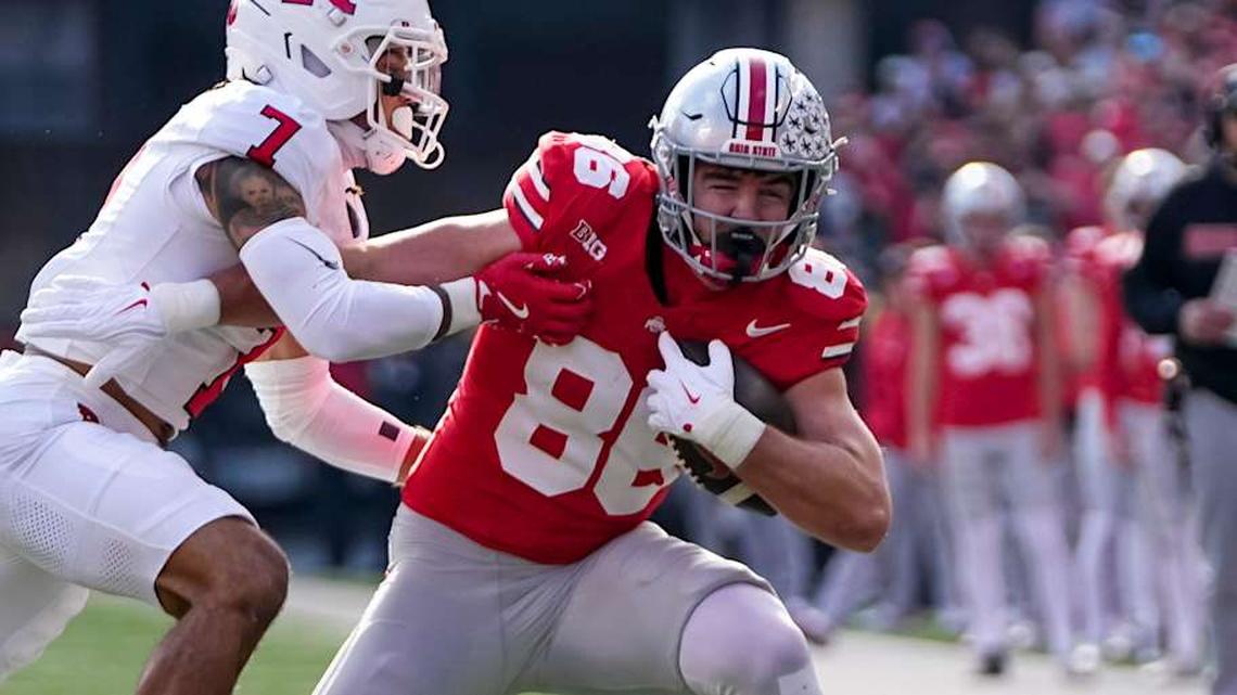  Ohio State Buckeyes tight end Max Klare (86) tries to run past Rutgers Scarlet Knights defensive back Cam Miller (7) during the NCAA football game at Ohio Stadium in Columbus on Nov. 22, 2025. Ohio State won 42-9. | Adam Cairns/Columbus Dispatch / USA TODAY NETWORK via Imagn Images 