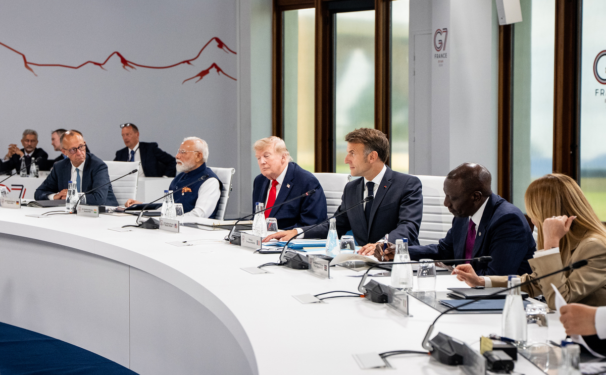 President Donald Trump, center, attends a working session with other world leaders during the G7 Summit in Evian-les-Bains, France, June 16, 2026. (Haiyun Jiang/The New York Times)