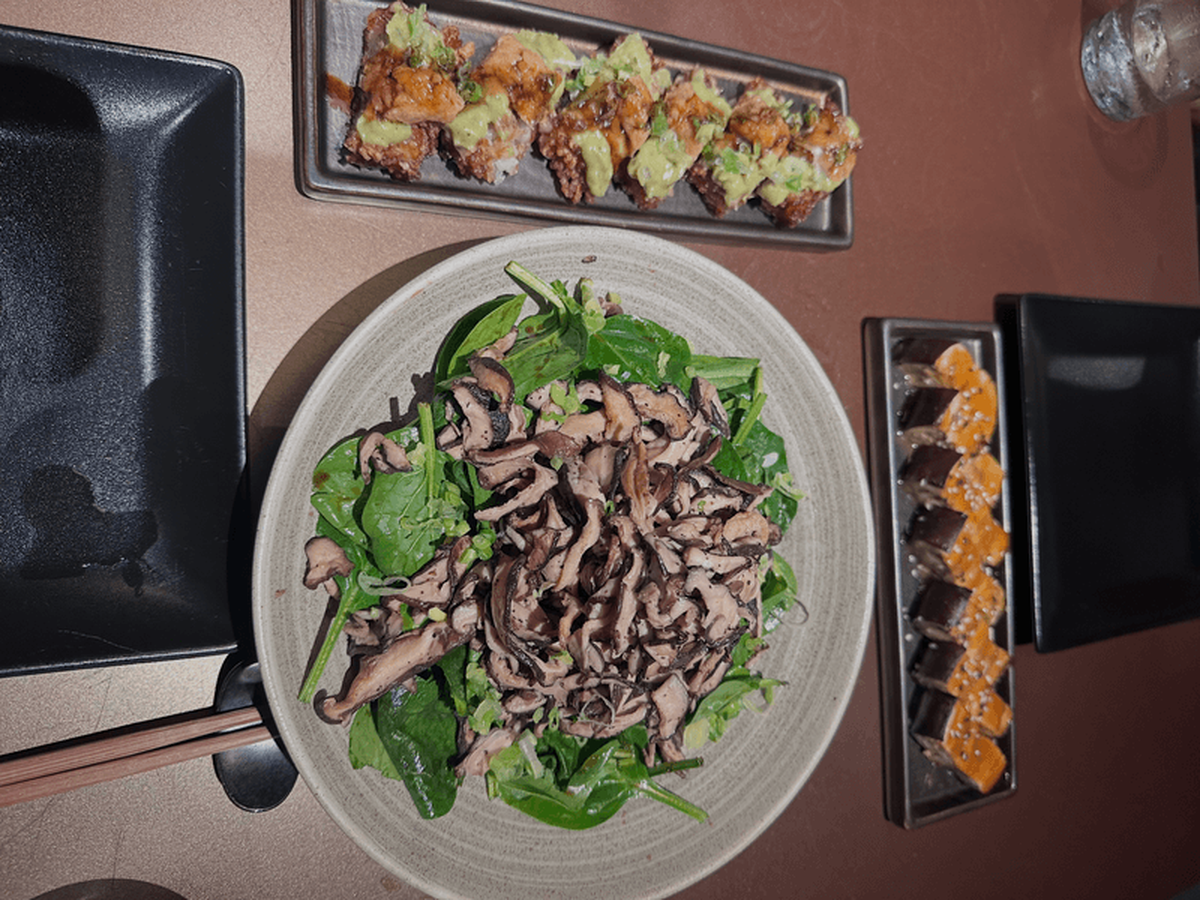  Our starter spread at ShinSen: the warm mushroom salad (center) along with the tuna crispy rice and miso eggplant. Photo credit: April Benshosan 