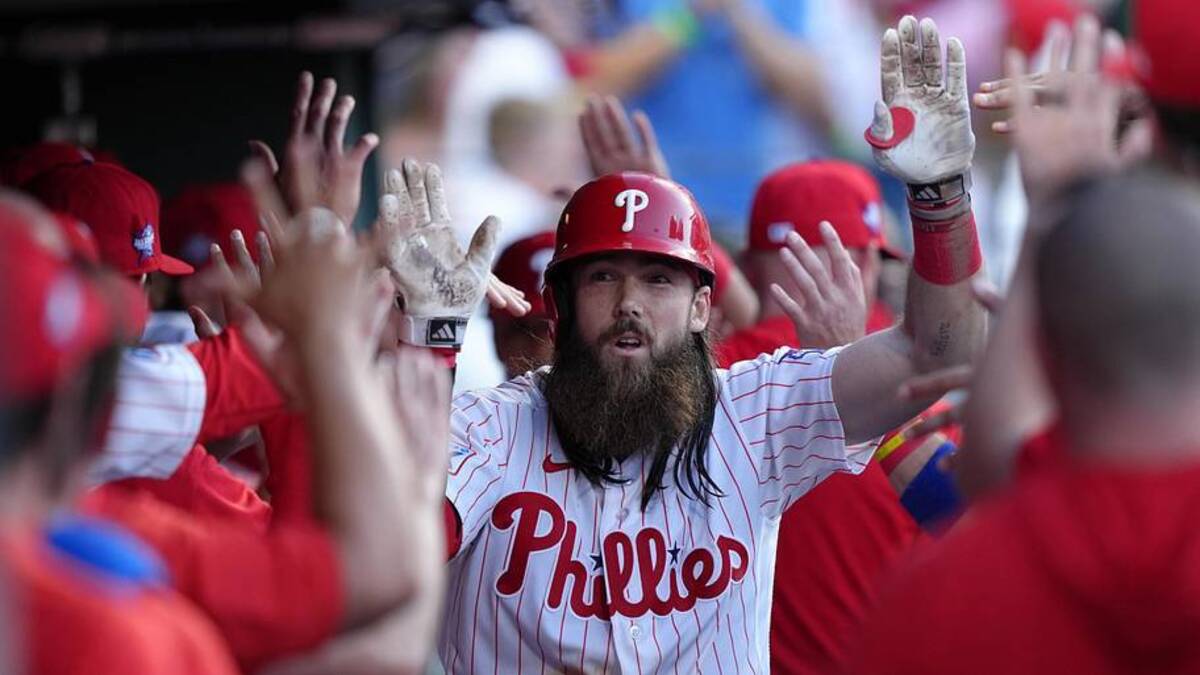  Jun 16, 2026; Philadelphia, Pennsylvania, USA; Philadelphia Phillies outfielder Brandon Marsh (16) celebrates with teammates hits a two-run home run against the Miami Marlins in the second inning at Citizens Bank Park. | Kyle Ross-Imagn Images 