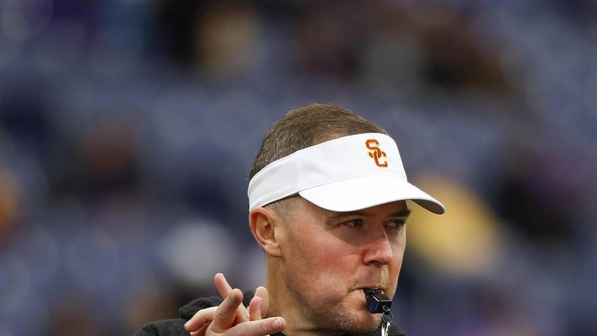  Nov 2, 2024; Seattle, Washington, USA; USC Trojans head coach Lincoln Riley watches pregame warmups against the Washington Huskies at Alaska Airlines Field at Husky Stadium. Mandatory Credit: Joe Nicholson-Imagn Images | Joe Nicholson-Imagn Images 