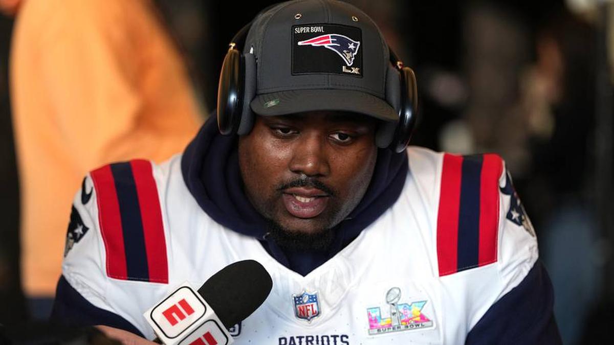  Feb 5, 2026; Santa Clara, CA, USA; New England Patriots defensive tackle Christian Barmore (90) talks to media members at the Santa Clara Marriott. Mandatory Credit: Darren Yamashita-Imagn Images | Darren Yamashita-Imagn Images 