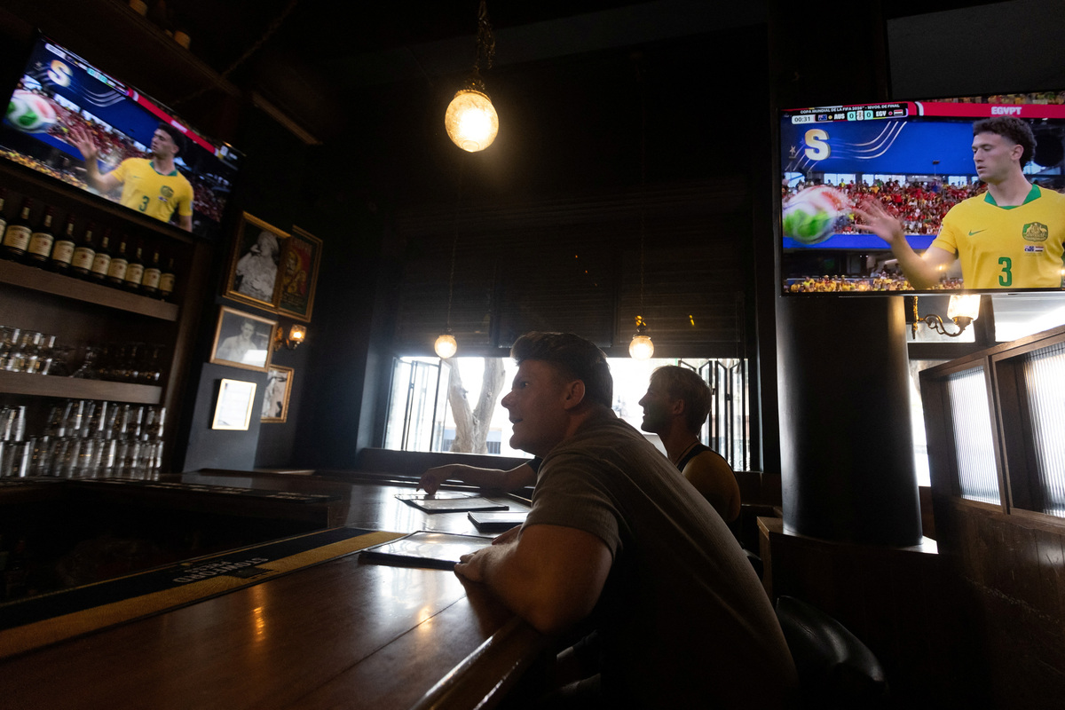 A man watches a FIFA World Cup 2026 match at the Duke of Lisbon pub, a British-Mexican bar, that expects to see fans gather to watch the match between Mexico and England in the World Cup Round of 16, in Mexico City, Mexico, July 3, 2026. REUTERS/Quetzalli Nicte-Ha