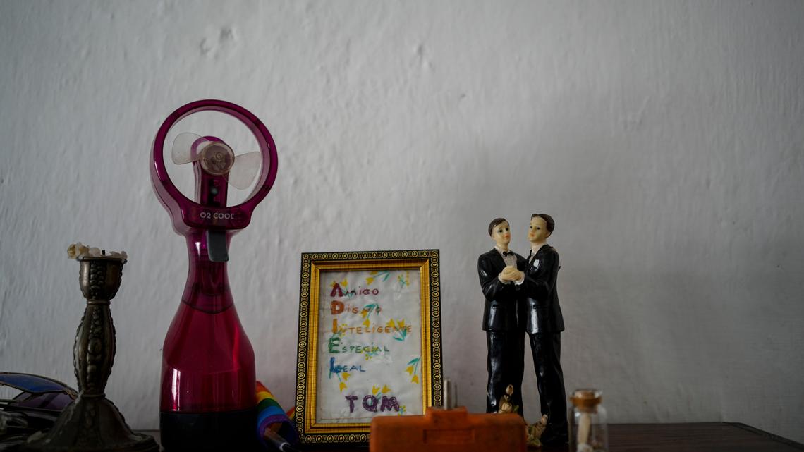 Figurines representing grooms on display in the home of partners Lázaro “Lachi” González and Adiel González in Matanzas, Cuba, in 2021.