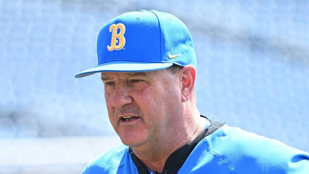  Jun 14, 2025; Omaha, Neb, USA; UCLA Bruins head coach John Savage on the field before the game against the Murray State Races at Charles Schwab Field. Mandatory Credit: Steven Branscombe-Imagn Images | IMAGN IMAGES via Reuters Connect 