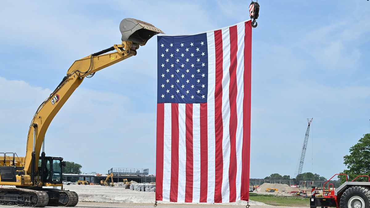 An American flag flies during "A Celebration of the Barn," during a Related Digital, Oracle and Open Ai open house as construction continues on the data center in Saline, Mich., on June 1, 2026. (Daniel Mears/The Detroit News/TNS)