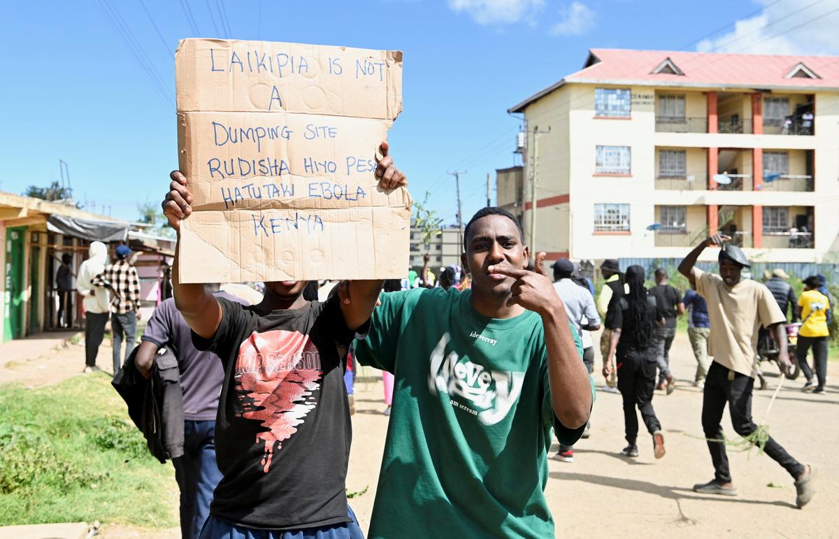 Demonstrators participate during a protest against a U.S.-backed Ebola quarantine plan on the establishment of a 50-bed facility at a Kenyan air force base that was intended to host Americans exposed to Ebola, in Nanyuki town, in Laikipia County, Kenya June 1, 2026. REUTERS/John Muchucha