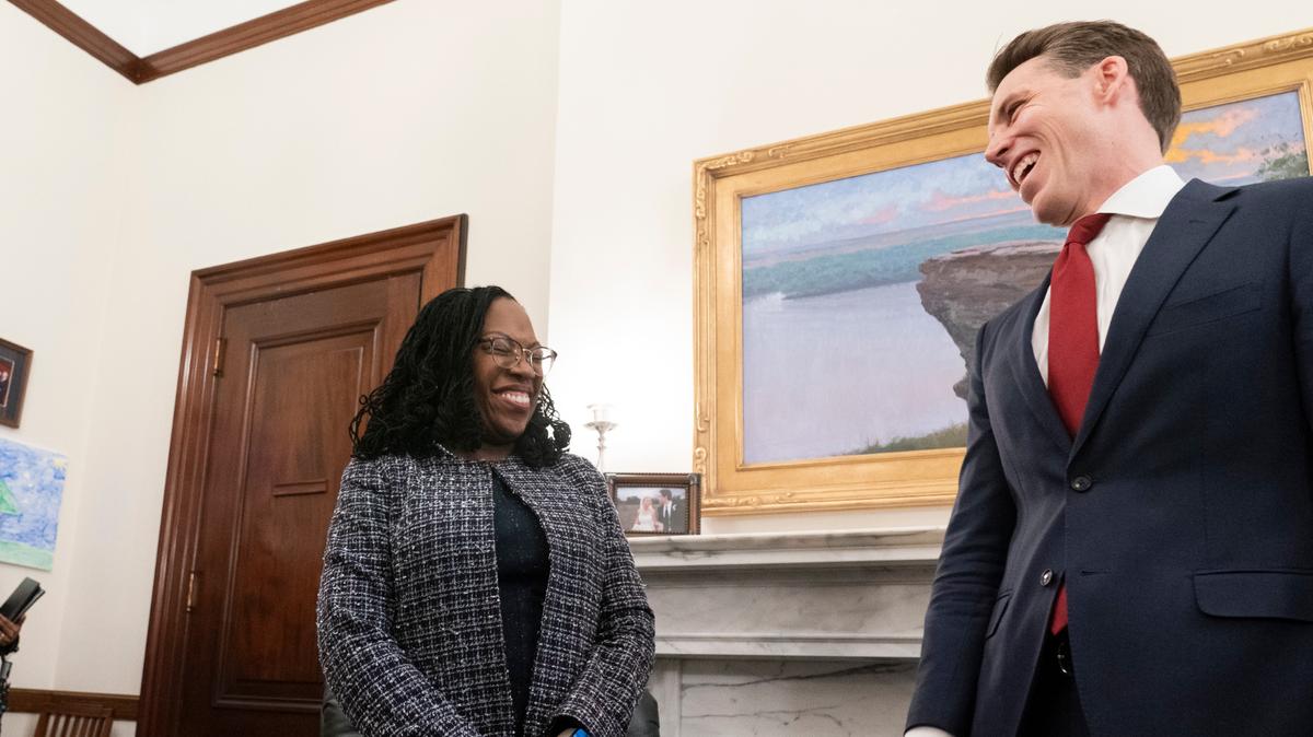 Supreme Court nominee Judge Ketanji Brown Jackson and Sen. Josh Hawley, R-Mo., share a laugh on Capitol Hill on March 9 in Washington. Since then, he has been criticizing her.
