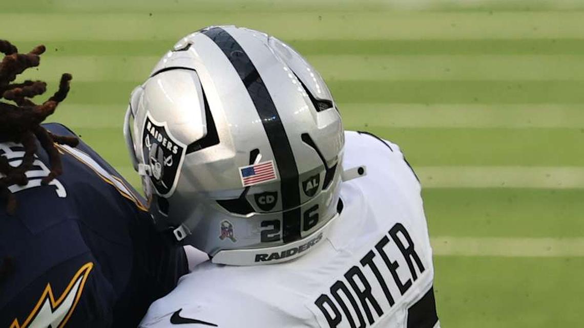 Nov 30, 2025; Inglewood, California, USA; Los Angeles Chargers wide receiver Quentin Johnston (1) makes a catch against the Las Vegas Raiders cornerback Darien Porter (26) during the first half at SoFi Stadium. Mandatory Credit: Kiyoshi Mio-Imagn Images | Kiyoshi Mio-Imagn Images 