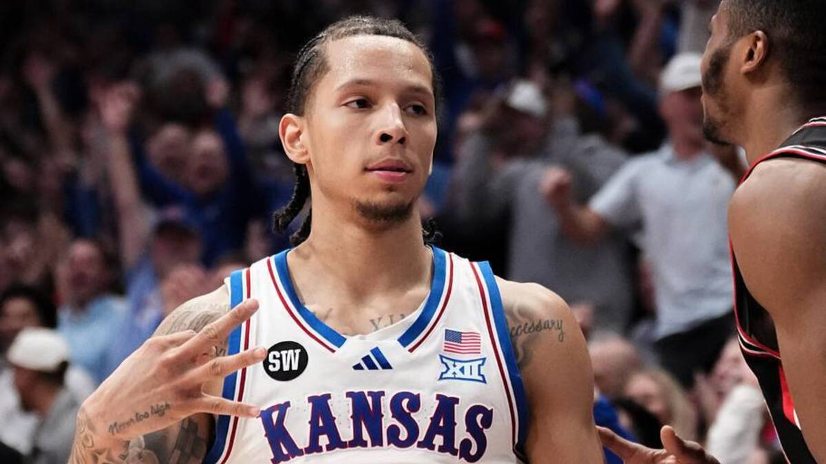  Feb 23, 2026; Lawrence, Kansas, USA; Kansas Jayhawks guard Tre White (3) celebrates after scoring against the Houston Cougars during the second half of the game at Allen Fieldhouse. Mandatory Credit: Denny Medley-Imagn Images | IMAGN IMAGES via Reuters Connect 