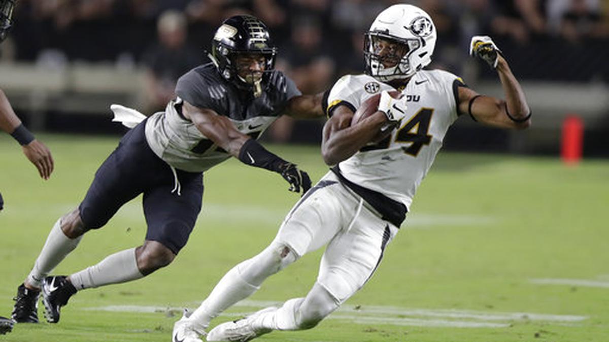 Missouri wide receiver Emanuel Hall (84) is tackled by Purdue cornerback Antonio Blackmon (14) during the first half of an NCAA college football game in West Lafayette, Ind., Saturday, Sept. 15, 2018.
