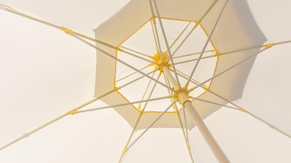 Stay Cool for Less: These Highly Rated Weather-Resistant Patio Umbrellas Are All Under $50 