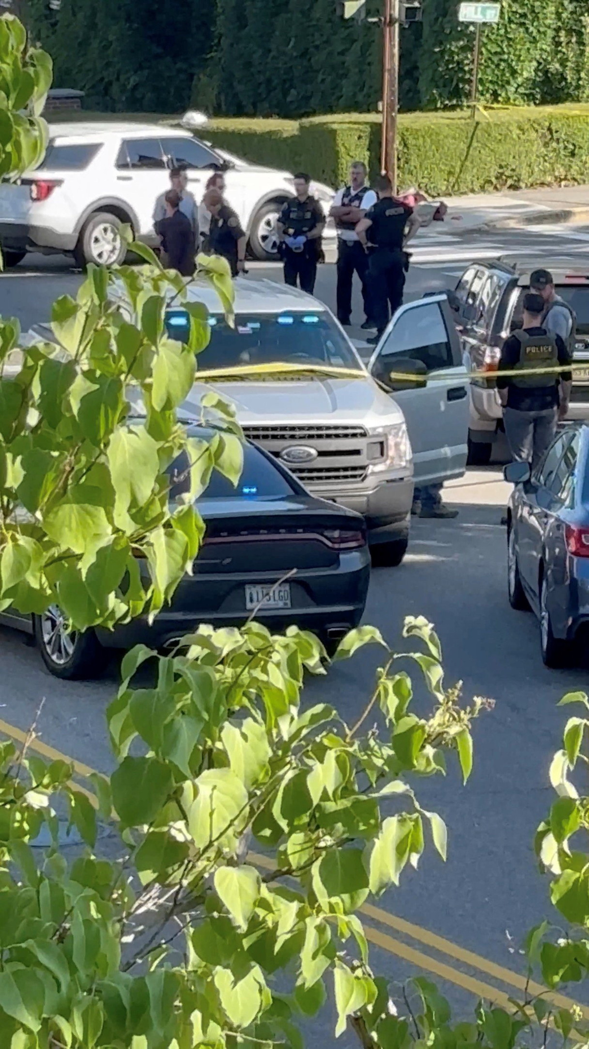Members of the police stand guard at a sealed off area in the aftermath of a shooting in Biddeford, Maine, U.S., July 13, 2026, in this screen grab obtained from a social media video. @Remote-Resource9021/Reddit/via REUTERS