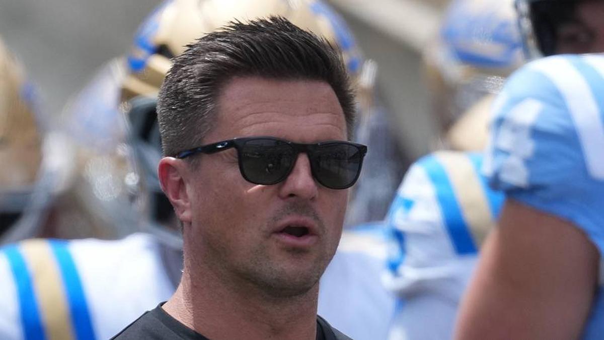  May 2, 2026; Pasadena, CA, USA; UCLA Bruins coach Bob Chesney (left) and son Bob Chesney watch during the spring game at Rose Bowl. Mandatory Credit: Kirby Lee-Imagn Images | Kirby Lee-Imagn Images 