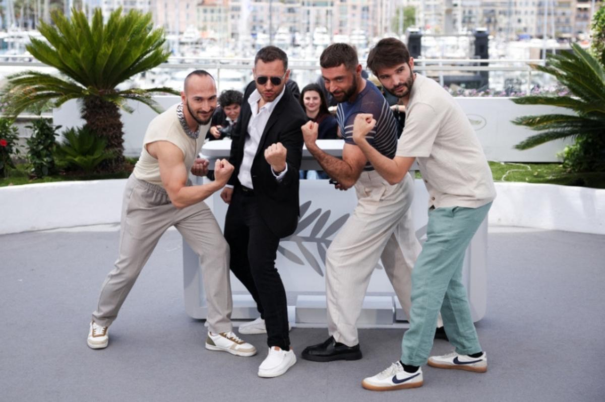 Directors Marco Nguyen and Nicolas Athane, screenwriters Brice Chevillard and Simon Balteaux pose during a photocall for the  animated film "Jim Queen" presented as part of Midnight Screenings at the 79th Cannes Film Festival in Cannes, France, May 18, 2026. REUTERS/Marko Djurica
