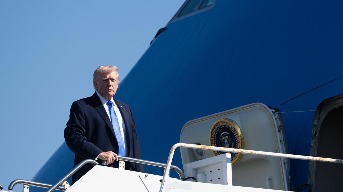 US President Donald Trump boards Air Force One prior to departure from Palm Beach International Airport in West Palm Beach, Florida on March 23, 2026. (Saul Loeb/AFP via Getty Images/TNS)