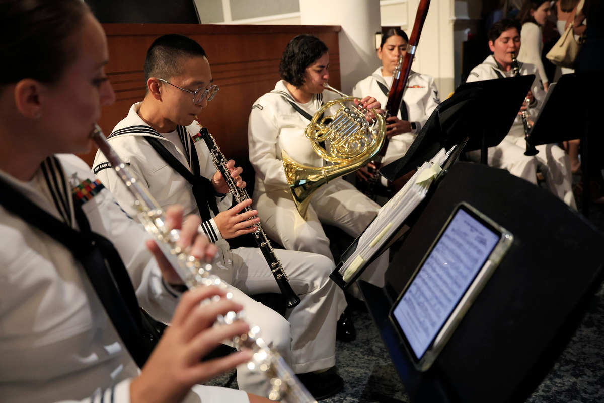 A Navy band plays “Anchors Aweigh” during an installation ceremony of City Council leadership, Thursday, June 25, 2026, in Jacksonville, Fla. Council members Nick Howland was sworn in as City Council President and Joe Carlucci as Vice President. Their one-year terms begin July 1.