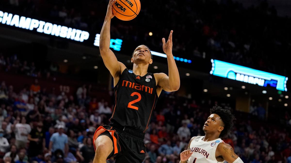 Miami guard Isaiah Wong (2) shoots and scores against Auburn during the second half of the basketball game in the second round of the NCAA tournament Sunday in Greenville, S.C.