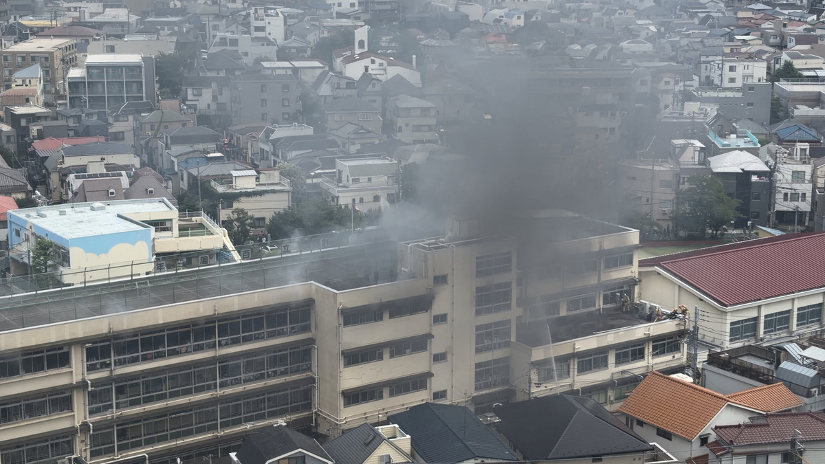 Smoke rises from a primary school after a fire broke out in Kita city, Tokyo, Japan, June 19, 2026, in this screengrab obtained from a social media video. @takanyo VIA X/via REUTERS