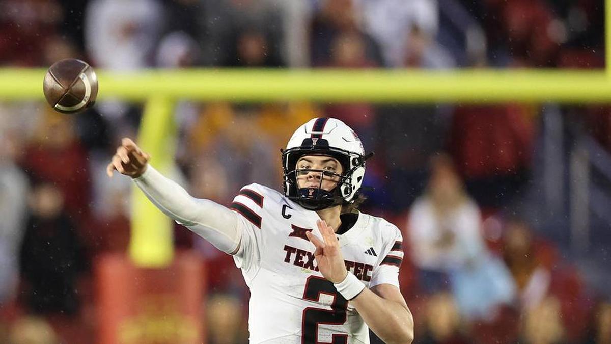  Nov 2, 2024; Ames, Iowa, USA; Texas Tech Red Raiders quarterback Behren Morton (2) rolls out to pass against the Iowa State Cyclones at Jack Trice Stadium. The Red Raiders won 23-22. Mandatory Credit: Reese Strickland-Imagn Images | Reese Strickland-Imagn Images 