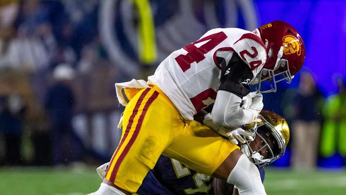  Oct 18, 2025; South Bend, Indiana, USA; Southern California Trojans safety Christian Pierce (24) hits Notre Dame Fighting Irish running back Jadarian Price (24) during the second half at Notre Dame Stadium. Mandatory Credit: Michael Caterina-Imagn Images | Michael Caterina-Imagn Images 