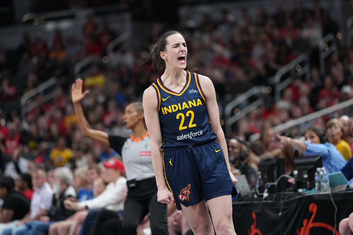  INDIANAPOLIS, IN - JUNE 14: Caitlin Clark #22 of the Indiana Fever celebrates during the game against the New York Liberty during a 2025 Commissioner's Cup game on June 14, 2025 at Gainbridge Fieldhouse in Indianapolis, Indiana. (Photo by A.J. Mast/NBAE via Getty Images) 