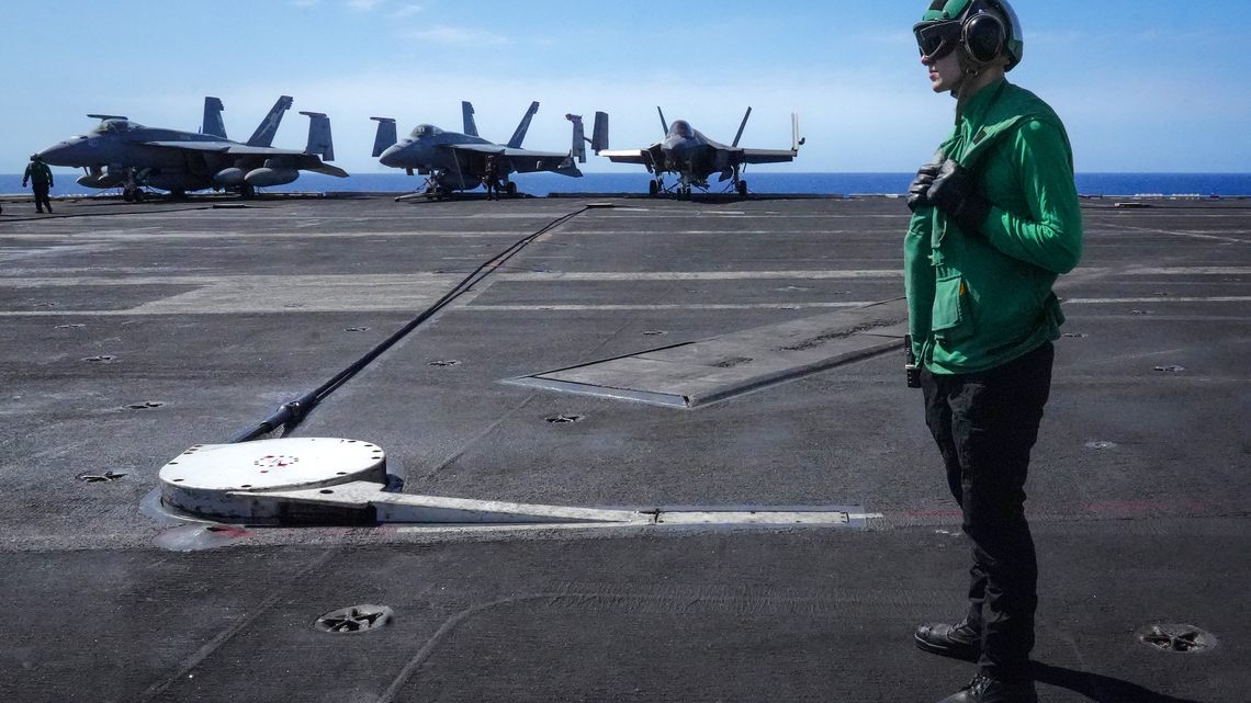 US may add carrier and 10,000 troops to Mideast, official says 