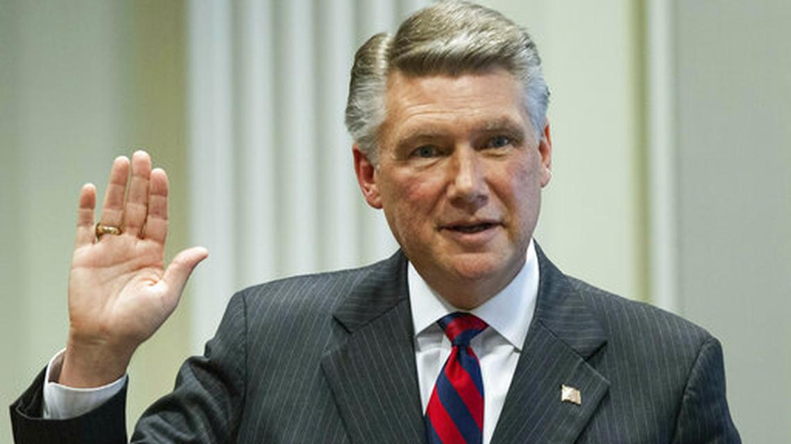 Mark Harris on Tuesday won the Republican primary in the 8th Congressional District. Five years earlier, in this Feb. 21, 2019 file photo, Harris prepares to testify during the fourth day of a hearings on voting irregularities in what was then the 9th Congressional District at the North Carolina State Bar in Raleigh.