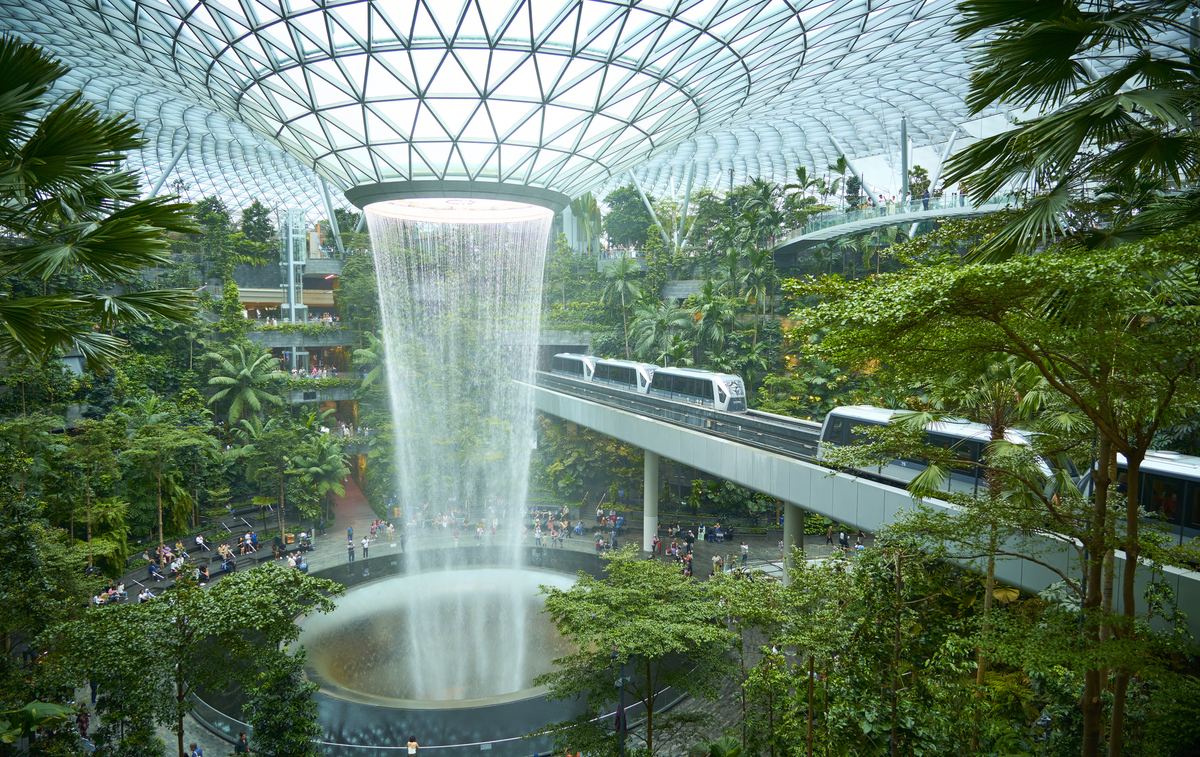  A view of the Rain Vortex, an indoor waterfall at Singapore’s Changi Airport. 