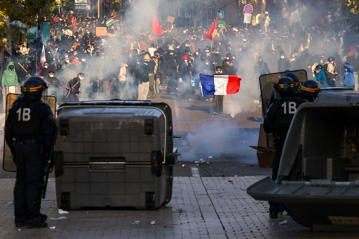 Violence flares in Paris after largely peaceful protests across France ...