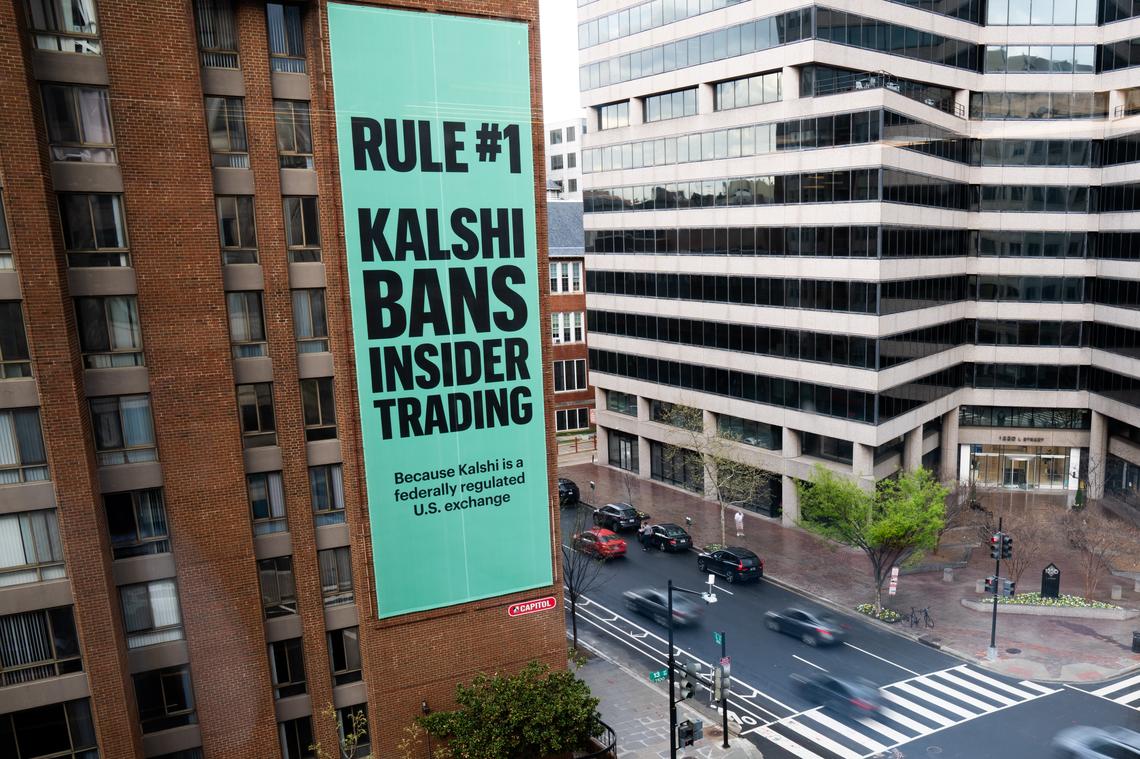  An advertisement for prediction market platform Kalshi hangs at 13th and L Streets in northwest Washington on April 1, 2026. (AP Photo/Allison Robbert, File) 