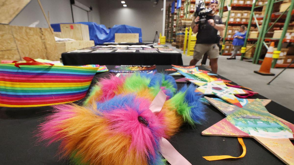 A colorful teddy bear is among artifacts and items collected after the Pulse tragedy. Those items are pictured at a climate-controlled warehouse in Orlando, Florida, on June 2, 2026. Pulse artifacts that have been carefully removed from the site, packaged for preservation and stored in custom crates, may soon be used for later display as part of the Pulse Memorial. (Stephen M. Dowell/Orlando Sentinel/TNS)