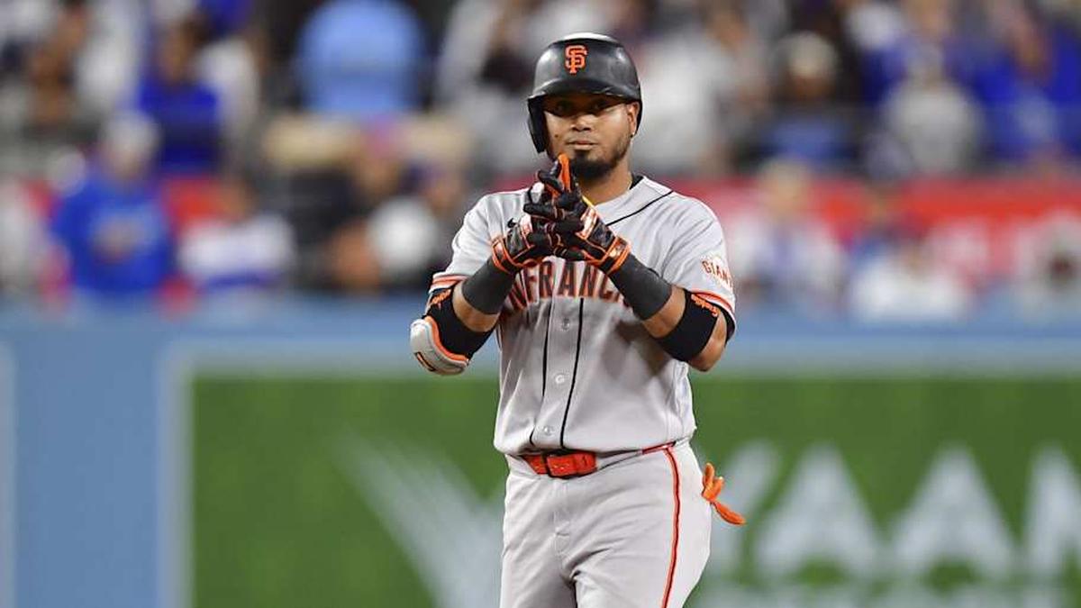 San Francisco Giants second baseman Luis Arraez (1) reacts after hitting a double in the eighth inning against the Los Angeles Dodgers at Dodger Stadium. | Gary A. Vasquez-Imagn Images 