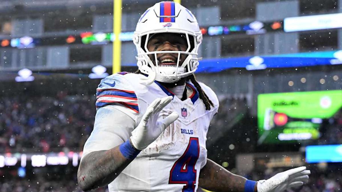  Dec 14, 2025; Foxborough, Massachusetts, USA; Buffalo Bills running back James Cook III (4) reacts after scoring a touchdown against the New England Patriots during the second half at Gillette Stadium. | Brian Fluharty-Imagn Images 