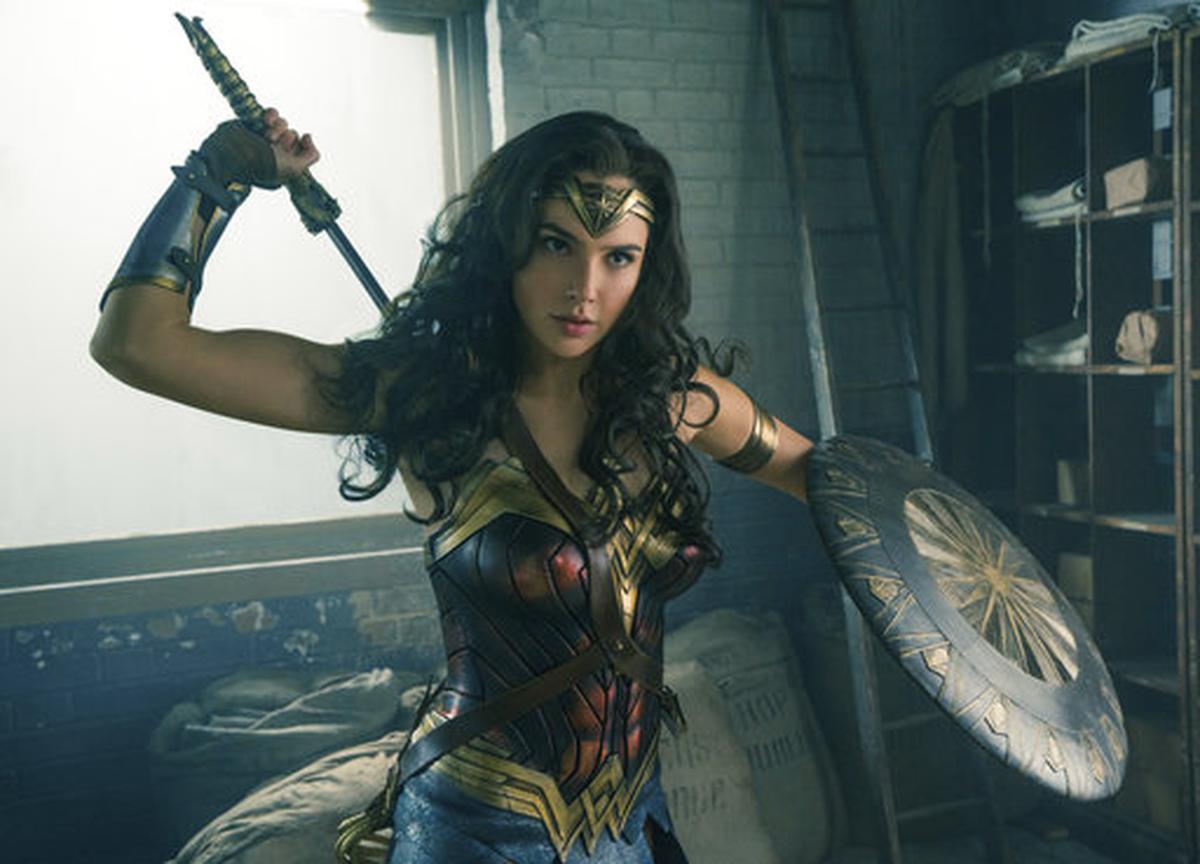 This image released by Warner Bros. Entertainment shows Gal Gadot in a scene from "Wonder Woman." “Wonder Woman” wrapped up Tom Cruise’s “The Mummy” at the weekend box office, pulling in an estimated $57.2 million in North American theaters.