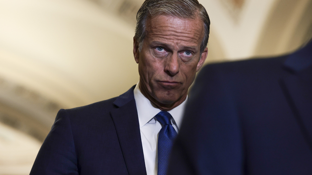 Senate Minority Whip John Thune, R-S.D., listens as then-Senate Minority Leader Mitch McConnell, R-Ky., addresses reporters following a weekly Republican policy meeting at the U.S. Capitol on September 21, 2021, in Washington, D.C. (Anna Moneymaker/Getty Images/TNS)