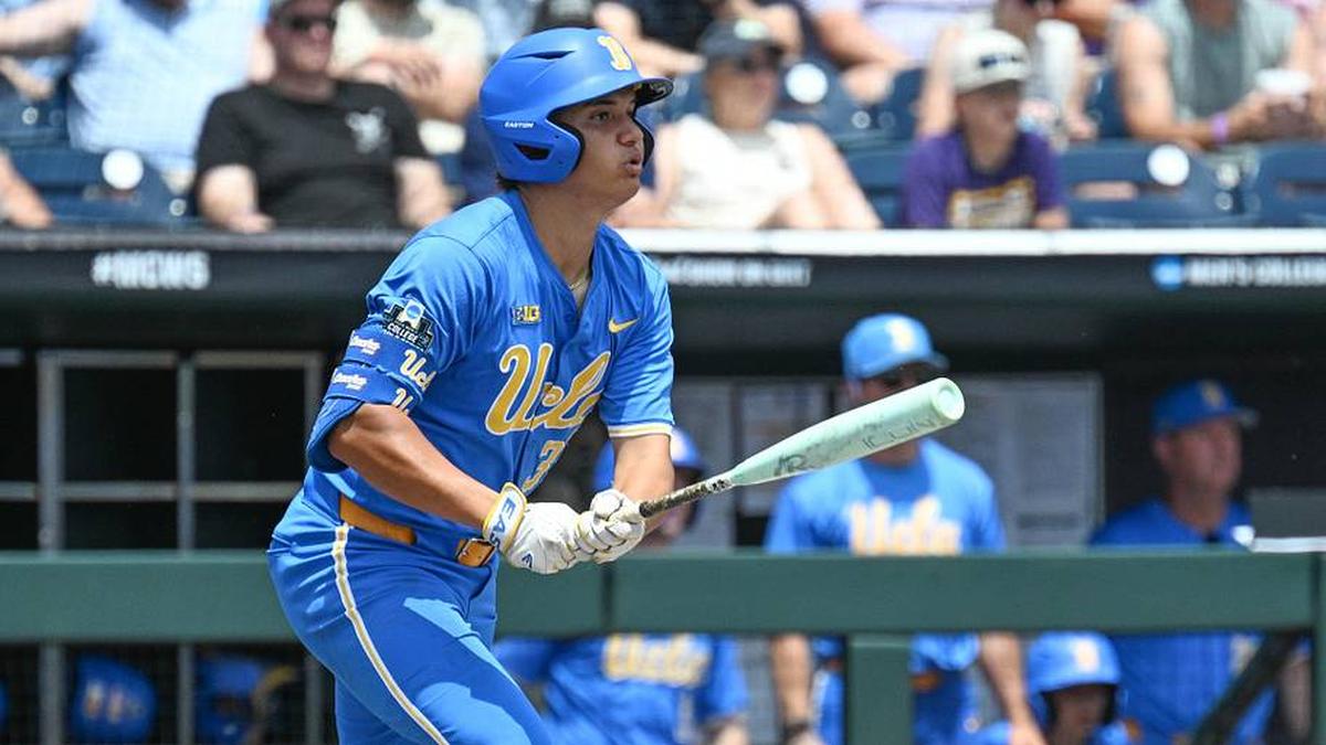  Jun 14, 2025; Omaha, Neb, USA; UCLA Bruins first baseman Mulivai Levu (39) singles against the Murray State Racers during the first inning at Charles Schwab Field. Mandatory Credit: Steven Branscombe-Imagn Images | Steven Branscombe-Imagn Images 