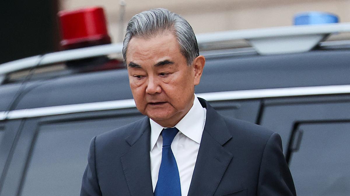 Chinese Foreign Minister Wang Yi leaves the Great Hall of the People in Beijing during Russian President Vladimir Putin visit to China, May 20, 2026. REUTERS/Maxim Shemetov/Pool