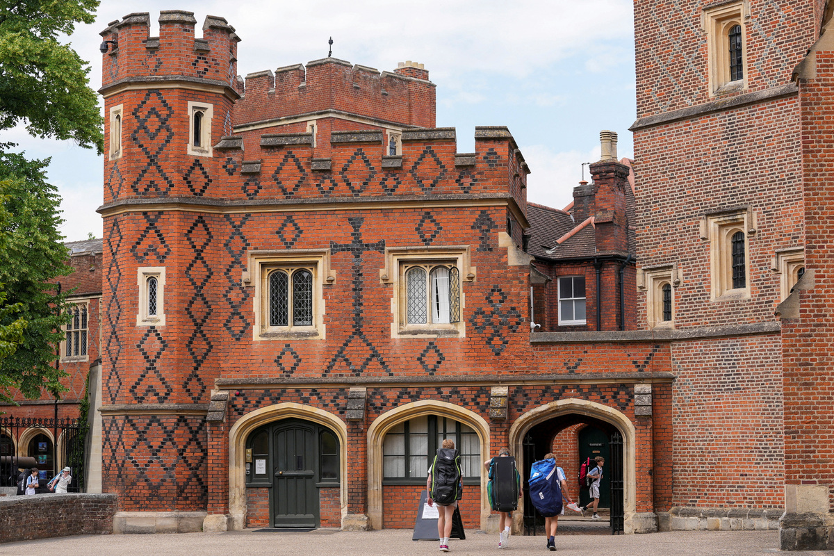 FILE PHOTO: Students walk outside Eton College in Windsor, Britain, June 12, 2025. REUTERS/Maja Smiejkowska/File Photo