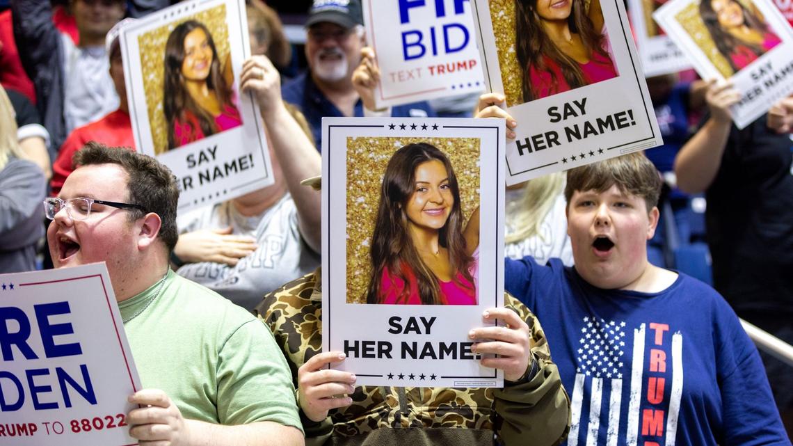 Supporters cheer for a campaign camera and hold signs with a photo of slain nursing student Laken Riley at a rally for Republican presidential candidate and former president Donald Trump at Forum River Center in Rome on Saturday, March 9, 2024. (Arvin Temkar / arvin.temkar@ajc.com)
