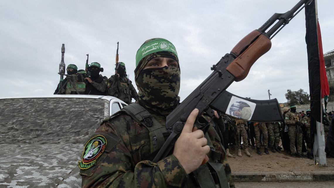 A show of force during a public hostage handover ceremony staged by Hamas in Nuseirat, in the central Gaza Strip, on Feb. 22, 2025. Two senior Hamas officials in Gaza said the group was prepared to relinquish some automatic rifles and other arms, a concession that falls short of Israeli-U.S. demands.